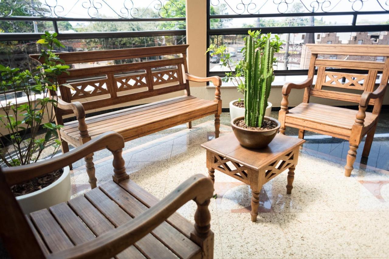 Holambra Garden Hotel Kültér fotó A set of Thai style wooden furniture